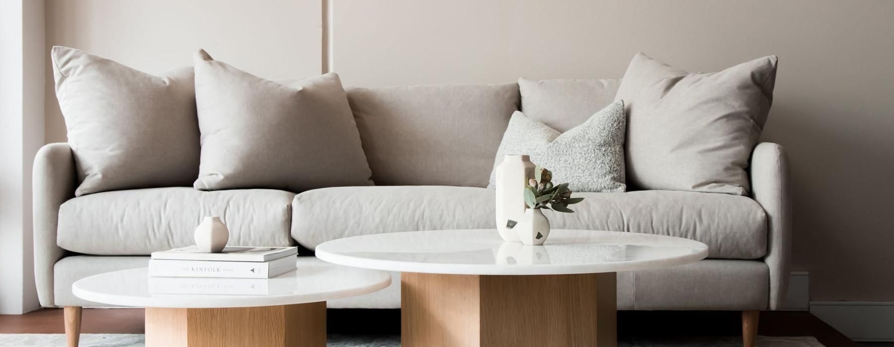 a white couch with a coffee table